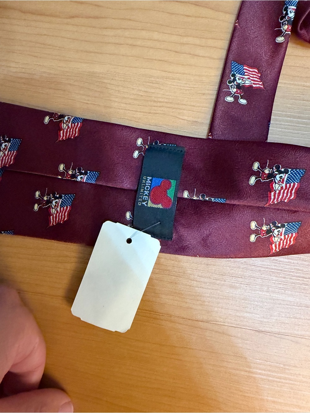 Mickey Mouse holding American flag tie with tag - Picture 3 of 4